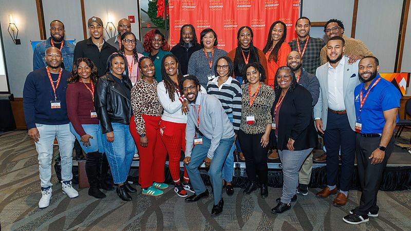 A large group of AALA community members gathered together for a photo at the close of a past gathering.